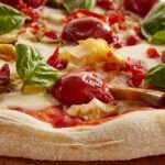 A origem da pizza: sabores, cultura e universalidade